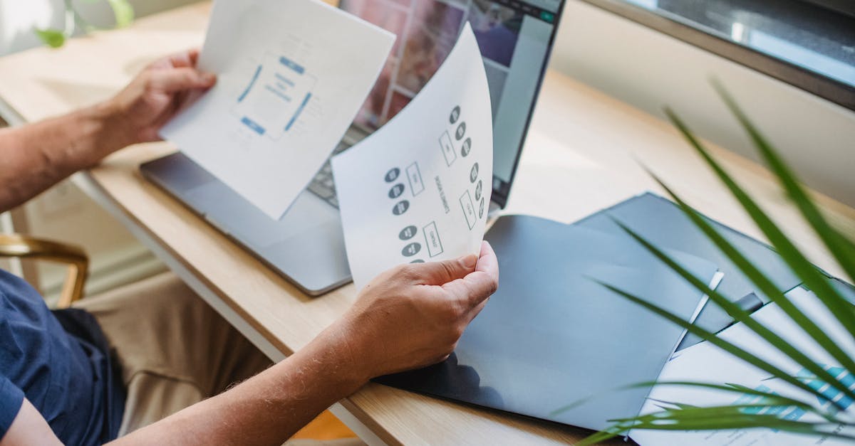 Content model planning cards beside a laptop.